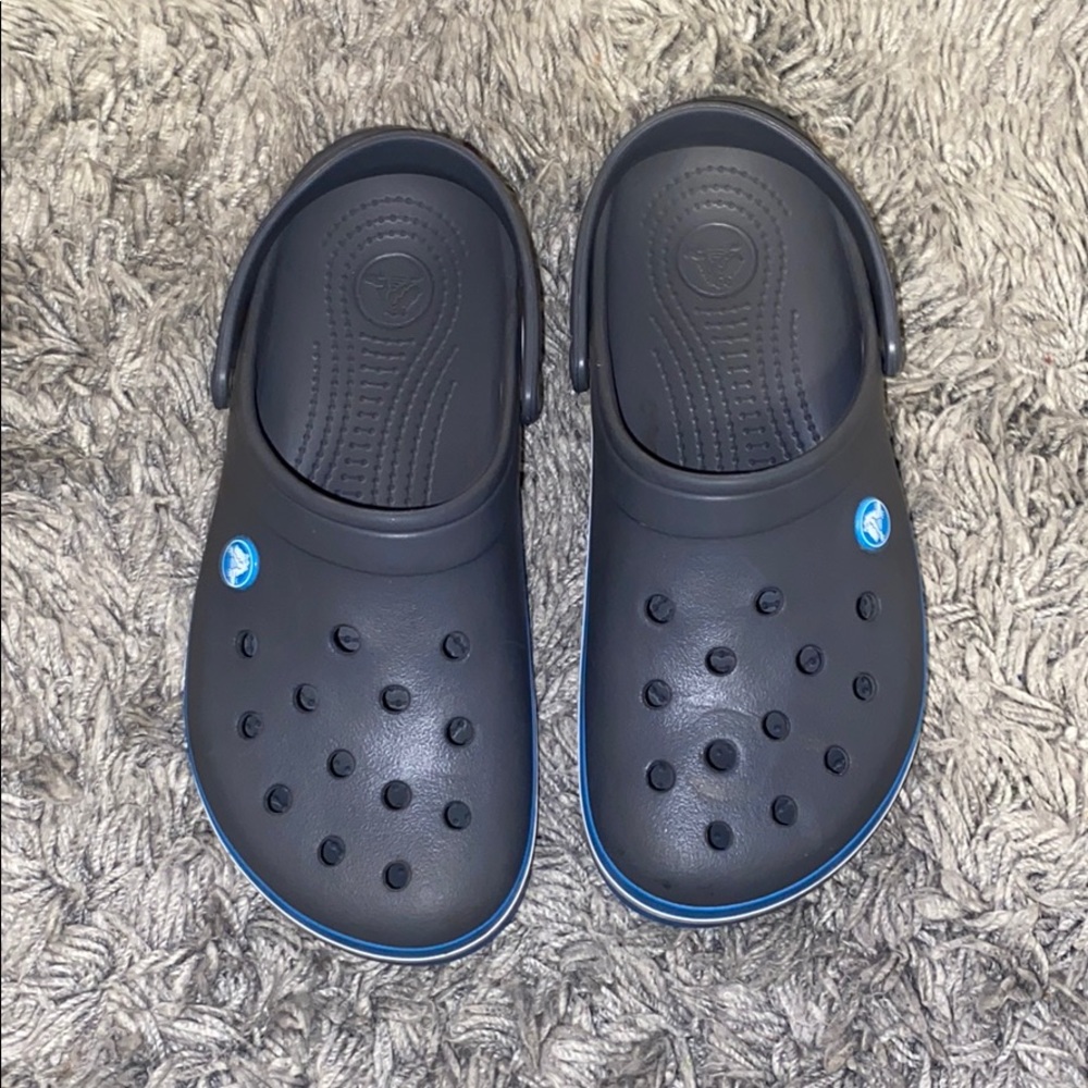 Gray and blue crocs in perfect shape